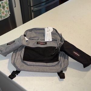 New Eastpack Pinnacle Sunday grey backpack with Two Benchmark Singles